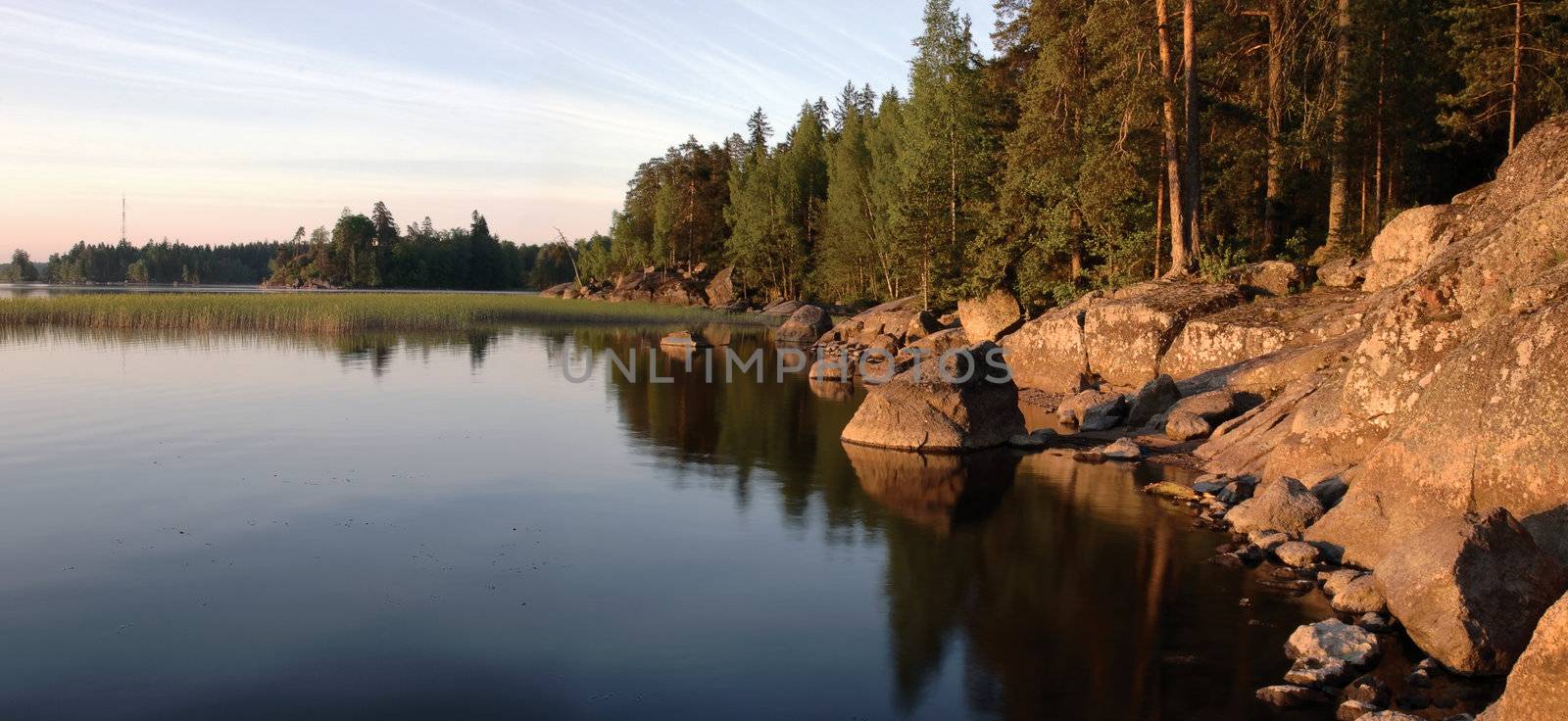 Russia, Vyborg, the Vyborg gulf. A landscape with a water table early in the morning