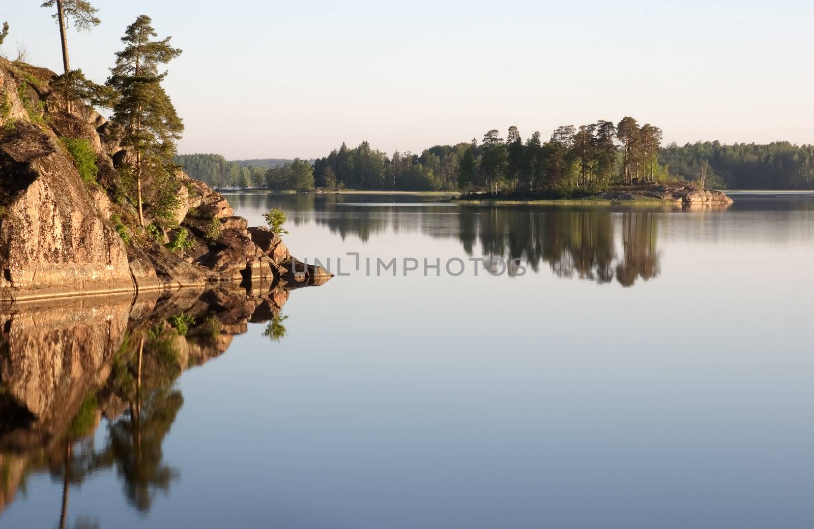 Russia, Vyborg, the Vyborg gulf. A landscape with a water table early in the morning