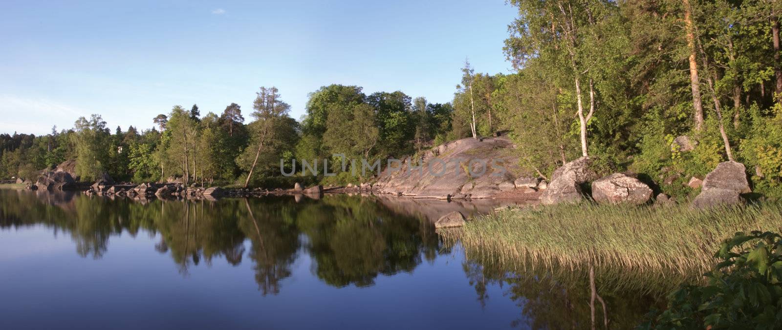 Russia, Vyborg, the Vyborg gulf. A landscape with a water table early in the morning