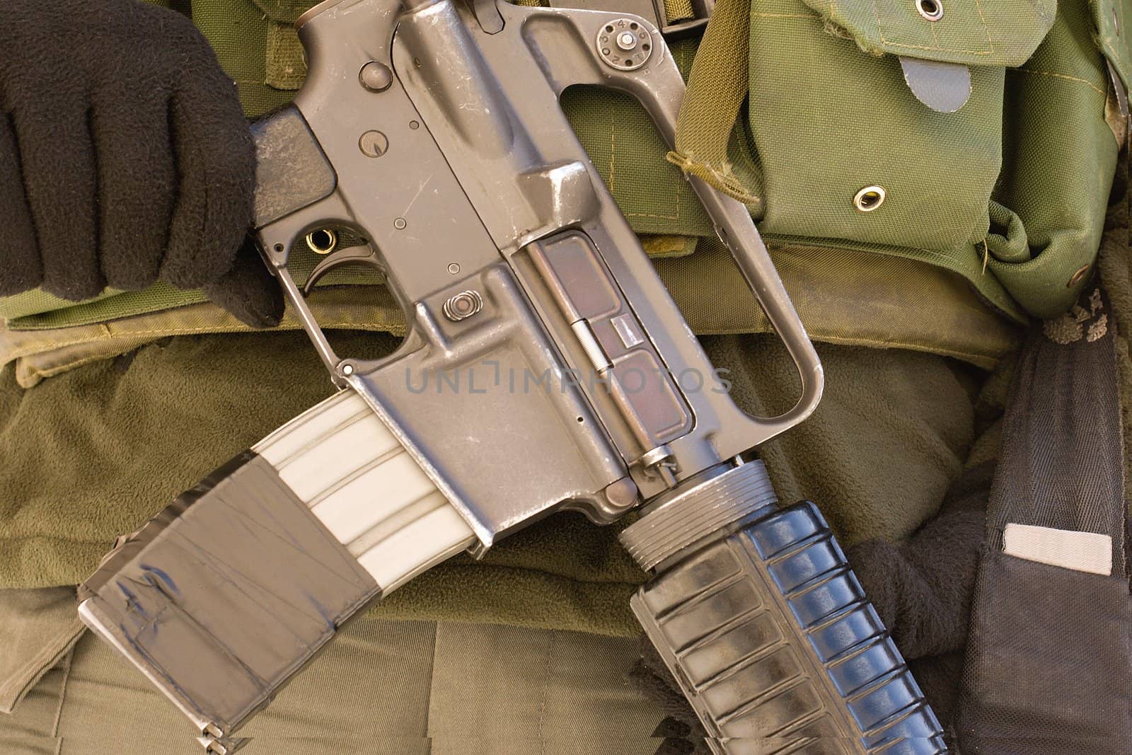 Israeli soldier with Submachine gun on her head