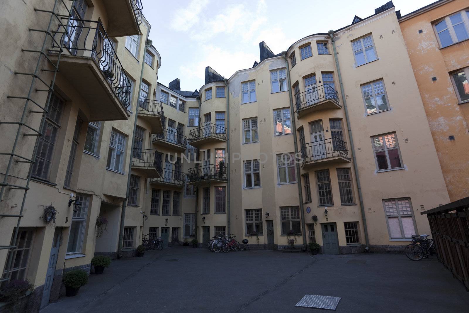 A Backyard view of city home buildings on nice fall day.