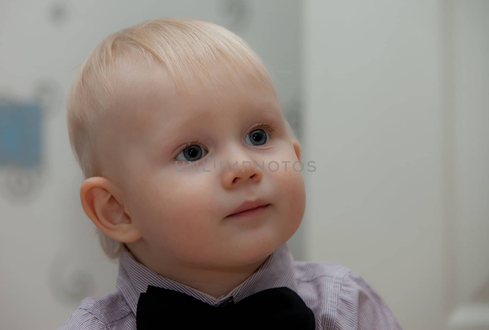 small child with bow tie. little baby