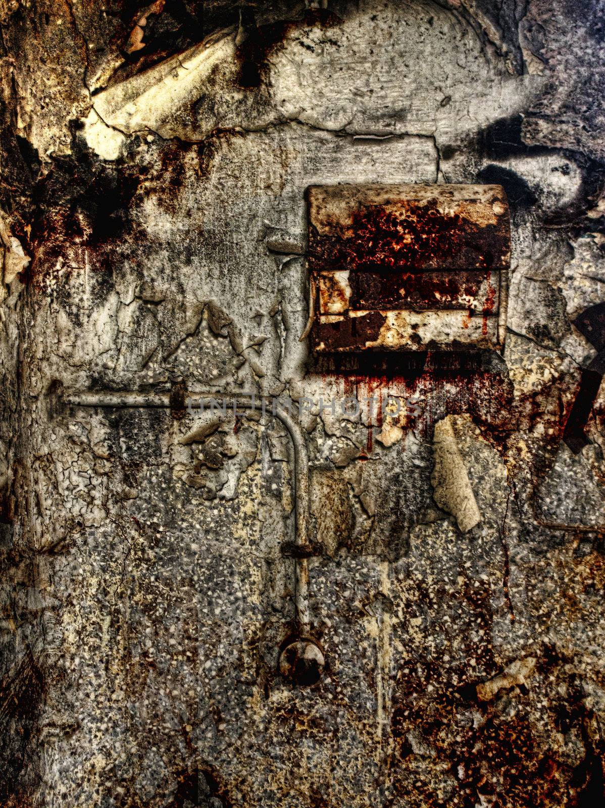 HDR image of an old bathroom wall and paper dispenser