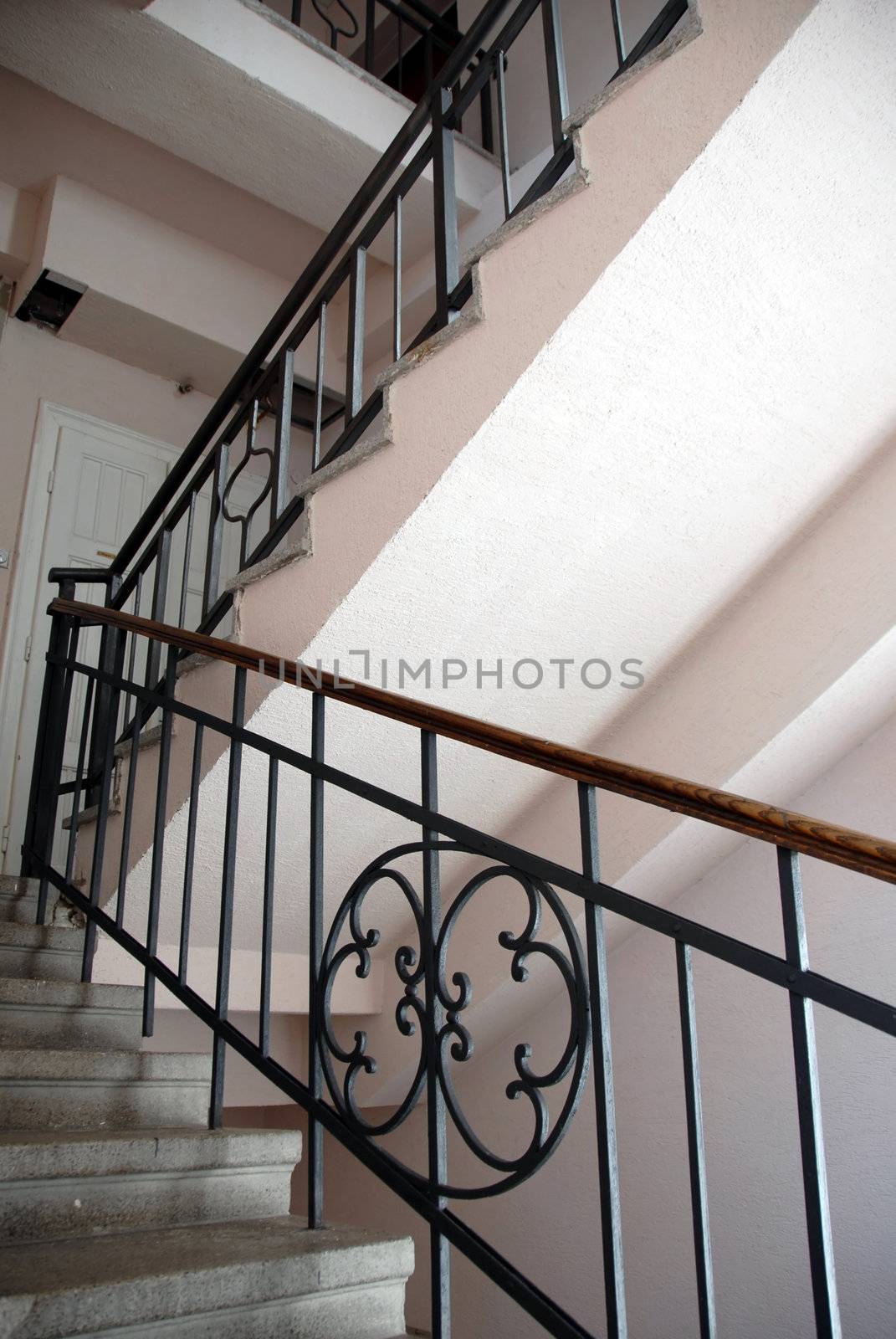staircase fragment with metallic railings indoor