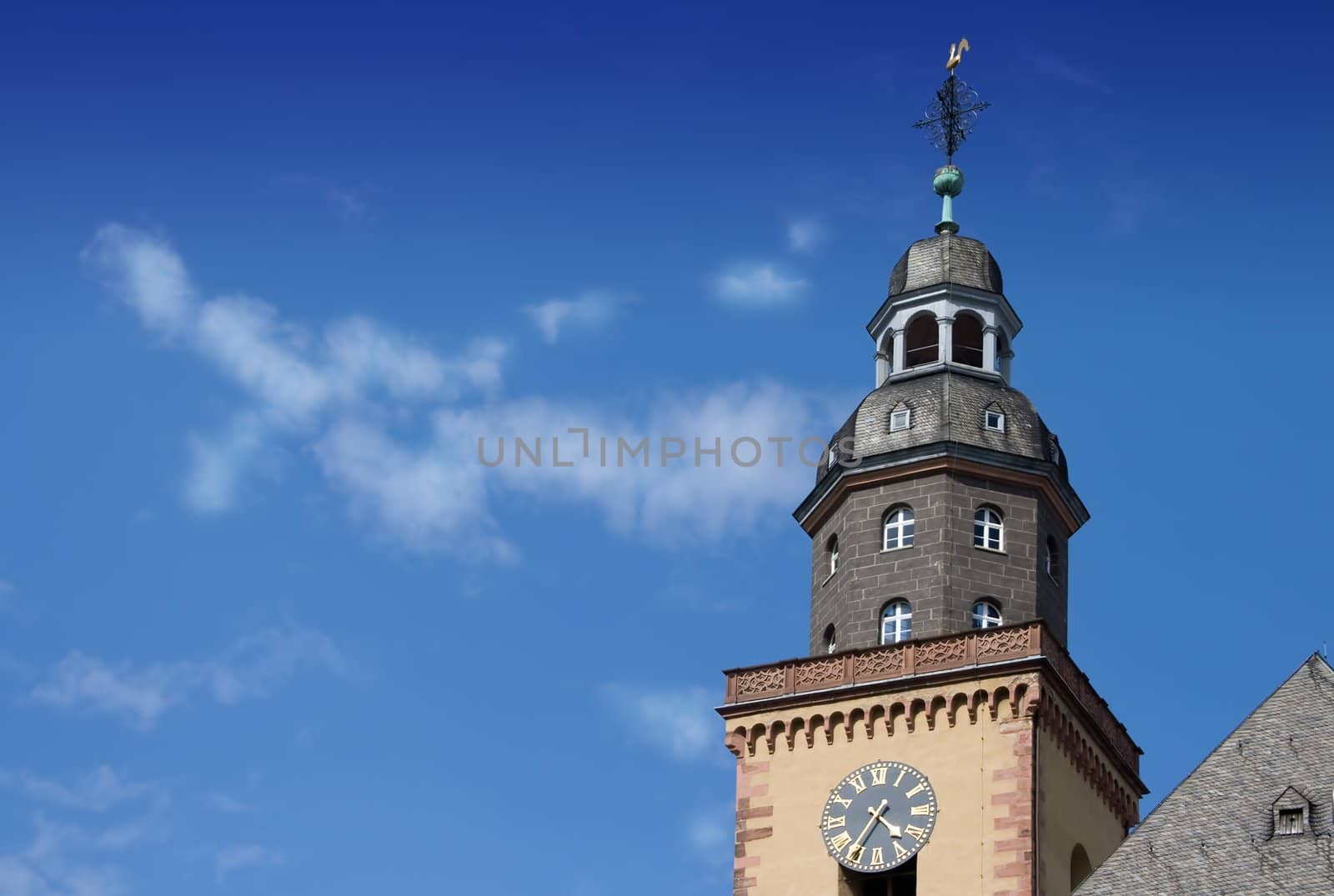 Church steeple against blue sky