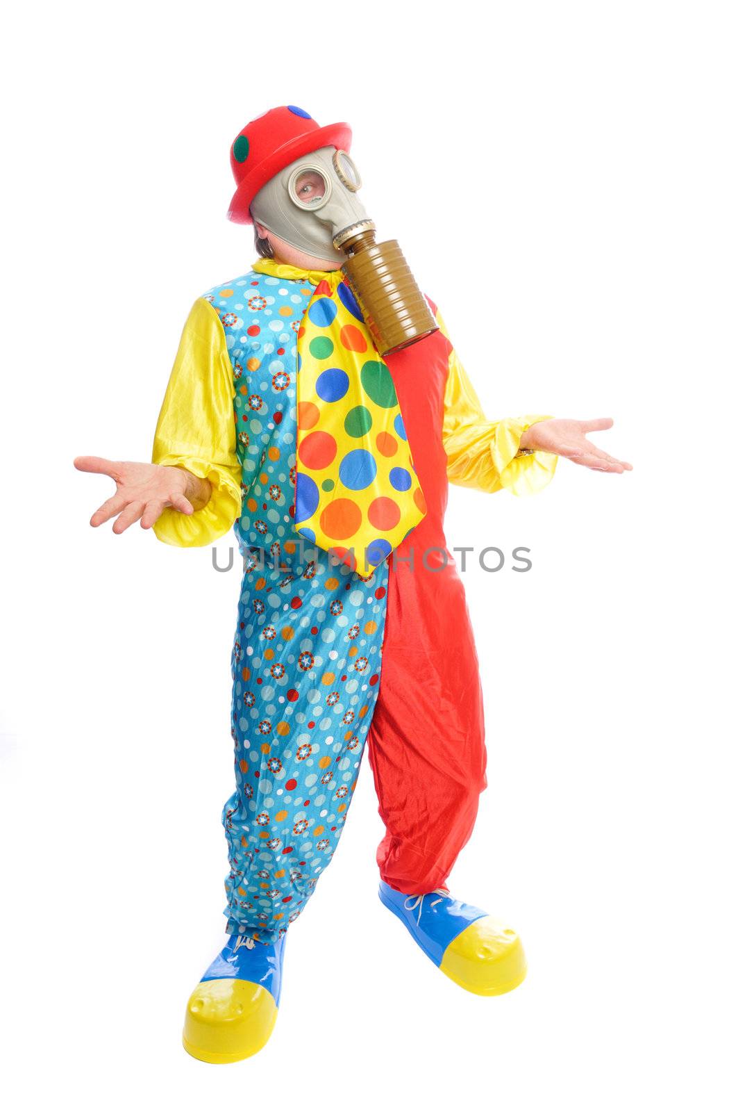 a man in a clown costume wearing a gasmask on a white background