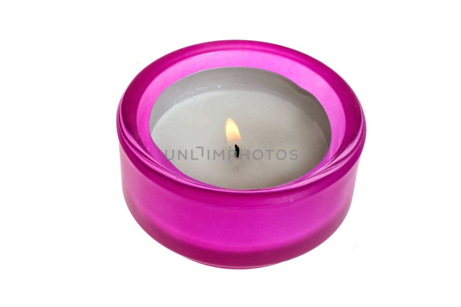 a pink burning candle