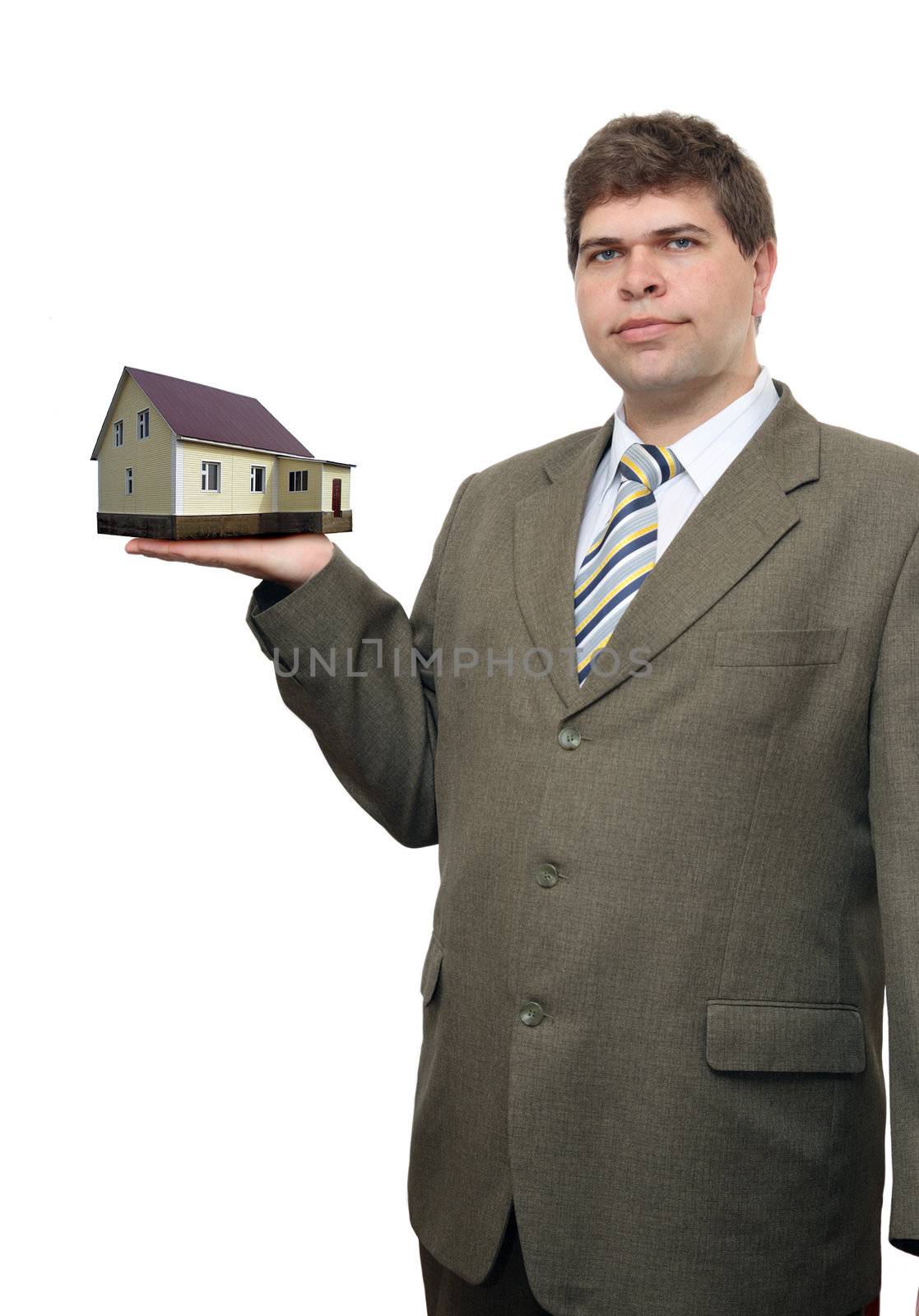 businessman with house in his hand