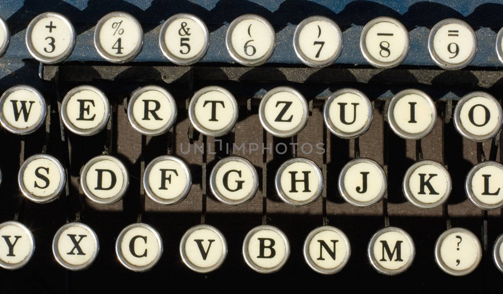 Antique typewriter keys on black useful for background