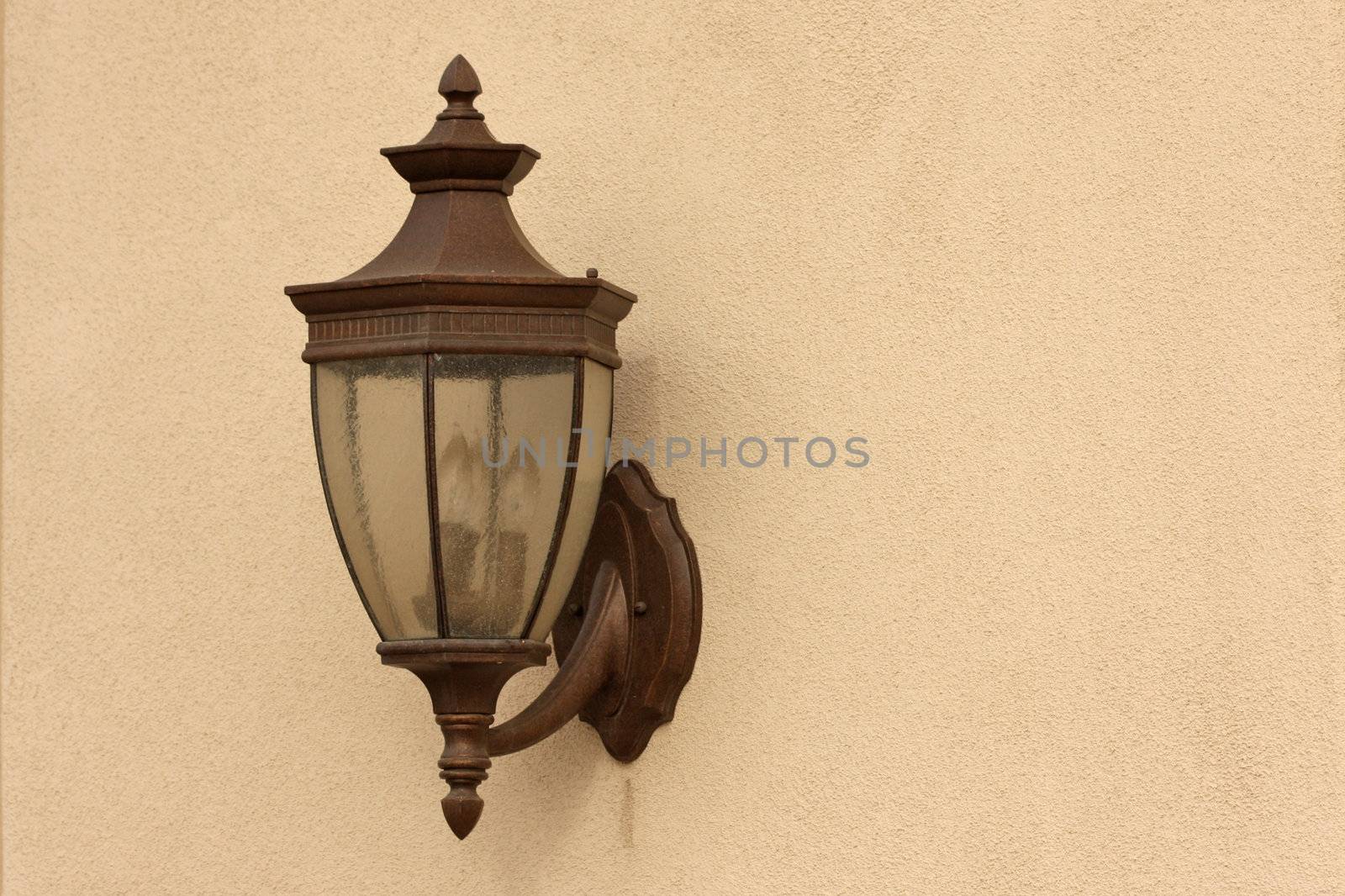 Beautiful Wall Lamp on Stucco Wall
