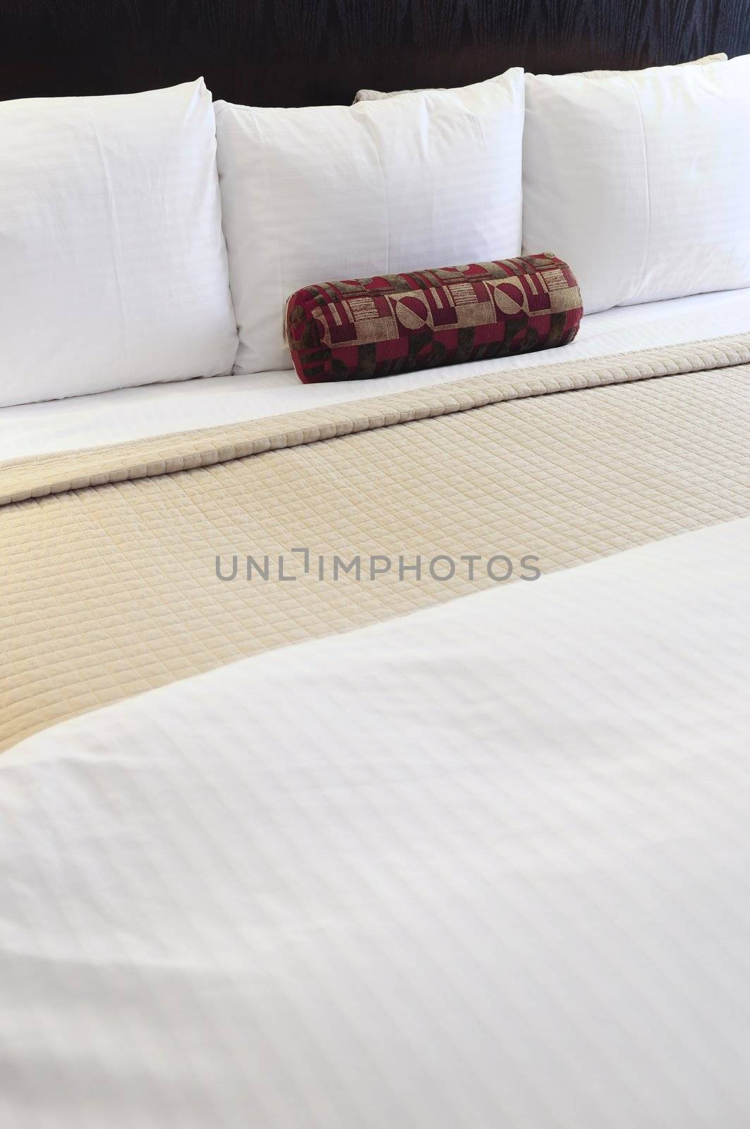 Comfortable bed in upscale hotel close up