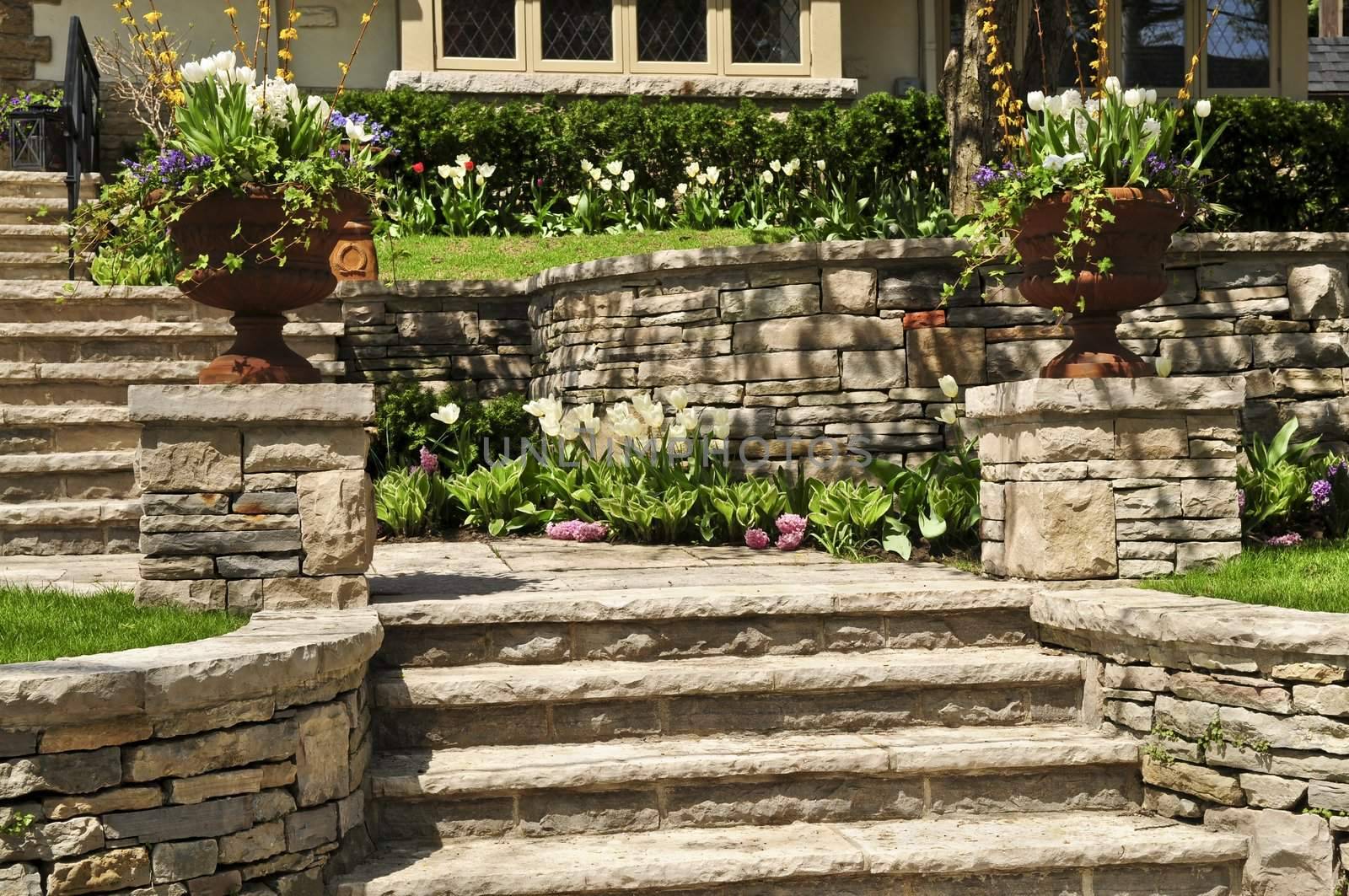 Natural stone landscaping in front of a house