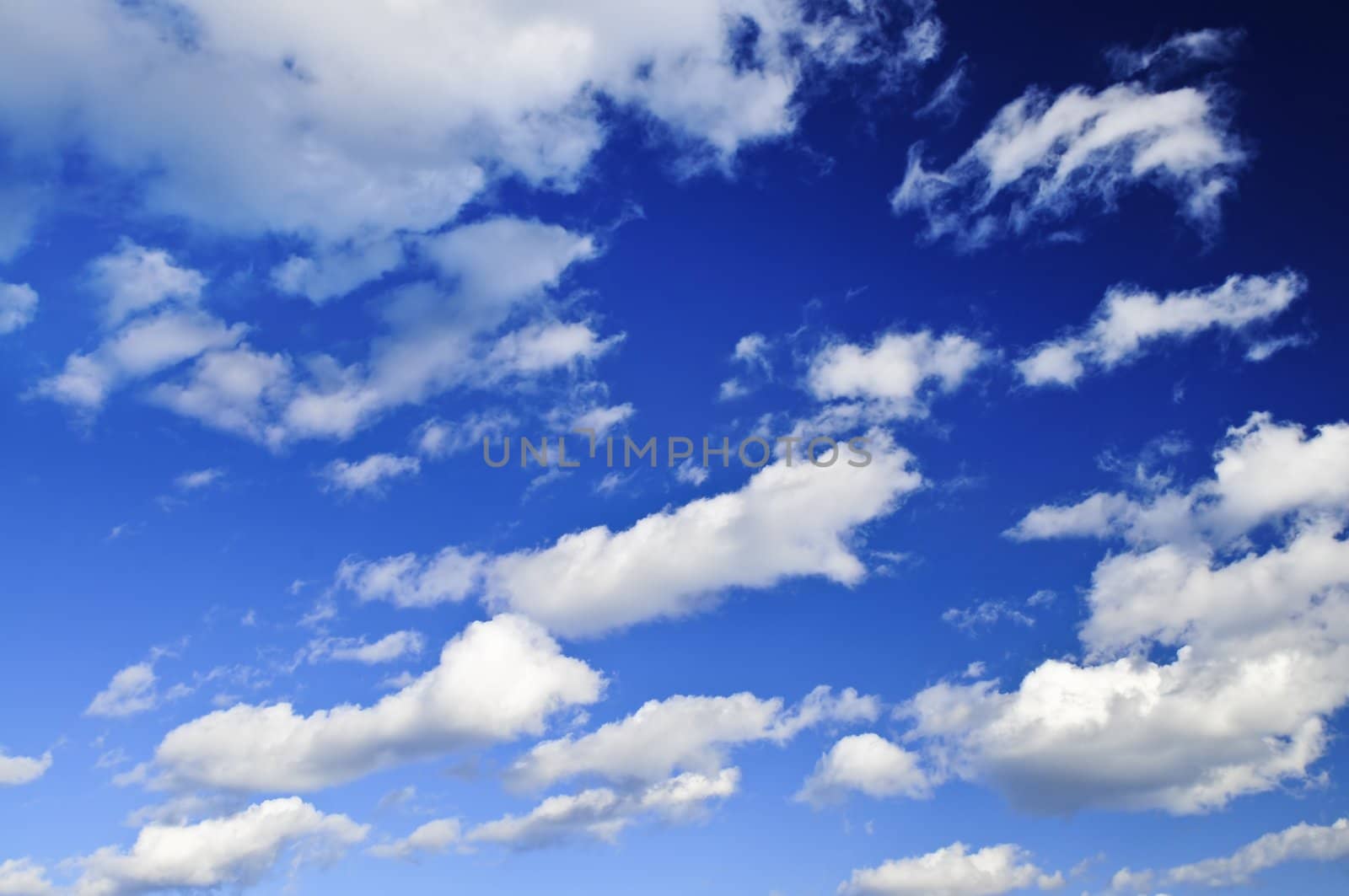 Background of blue sky with white clouds