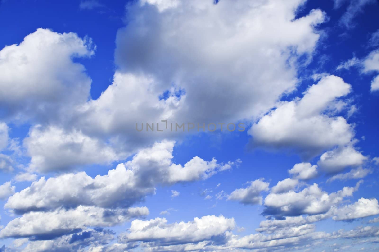 Background of blue sky with white clouds