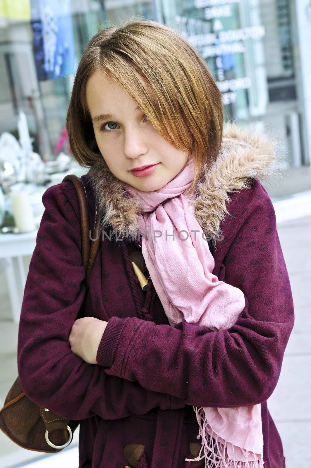 Teenage girl shivering by elenathewise