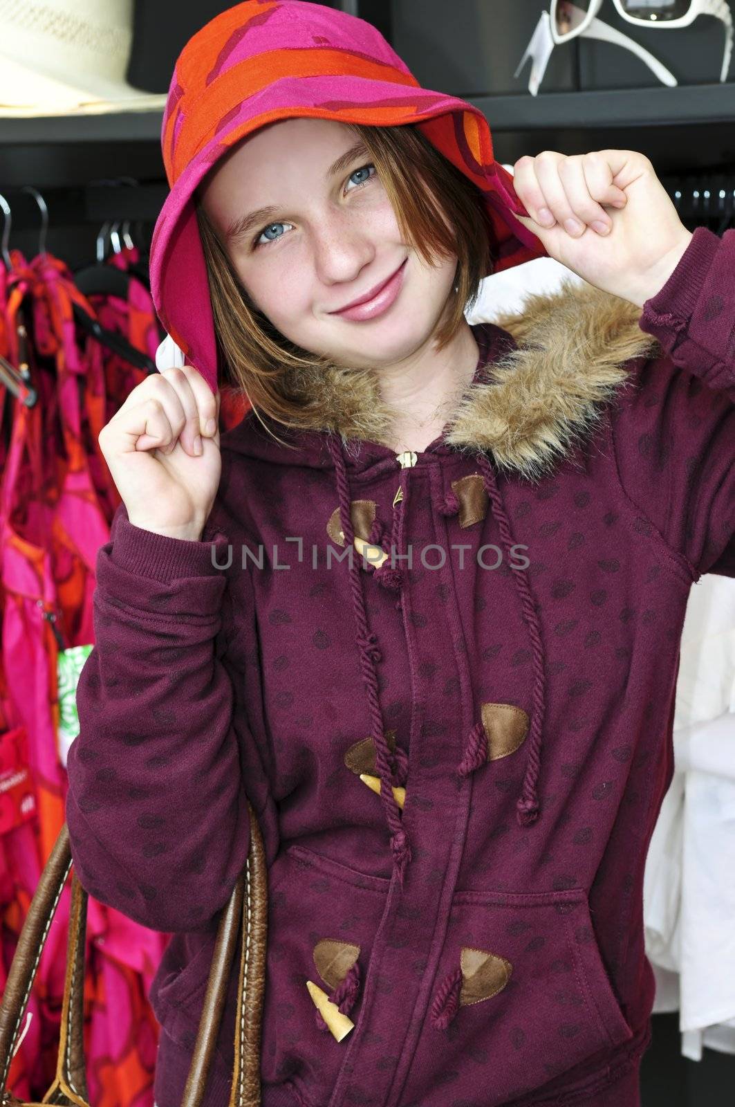 Teenage girl shopping for clothes and accessories