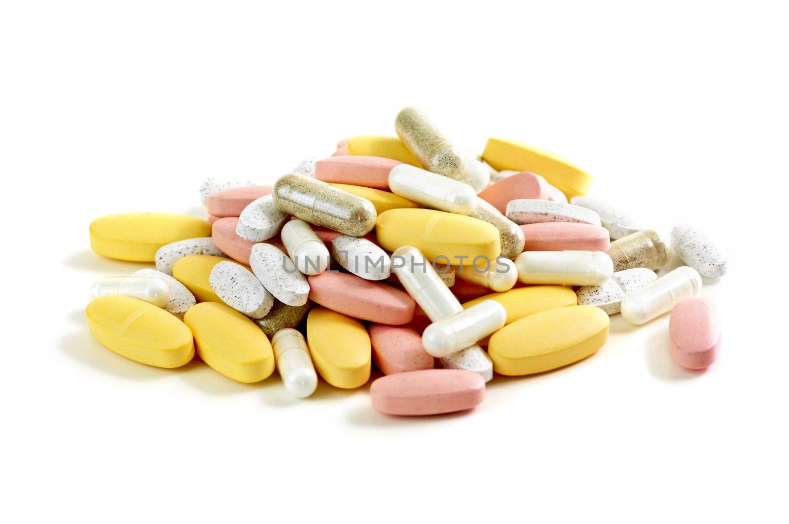 Mix of vitamins and herbal supplements on white background