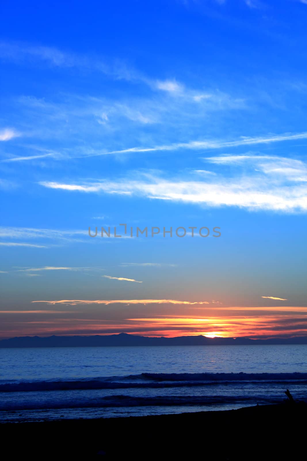 Beautiful sunset over the ocen at Ventura beach with channel islands in background