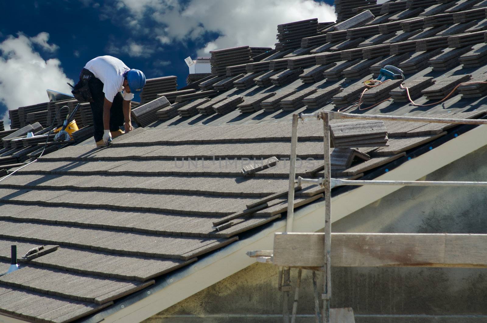 Roofer Laying Tile by Feverpitched