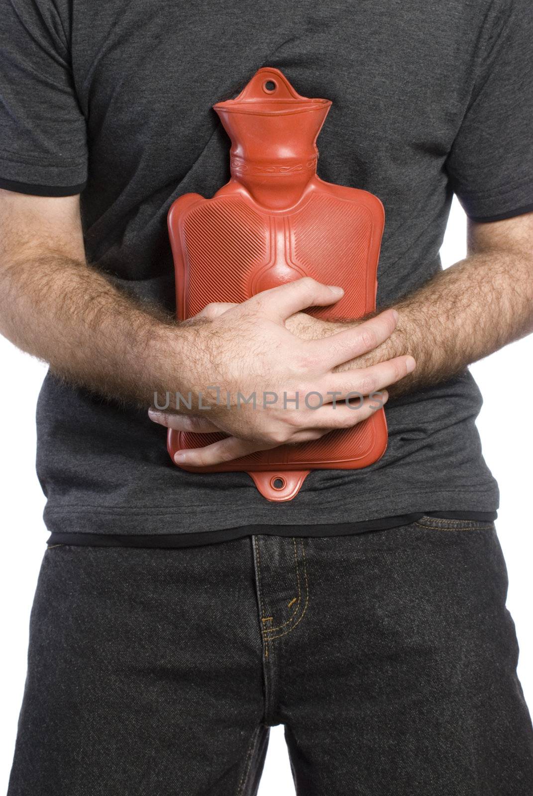 Close-up view of somebody holding a hot water bottle to soothe their sore stomach