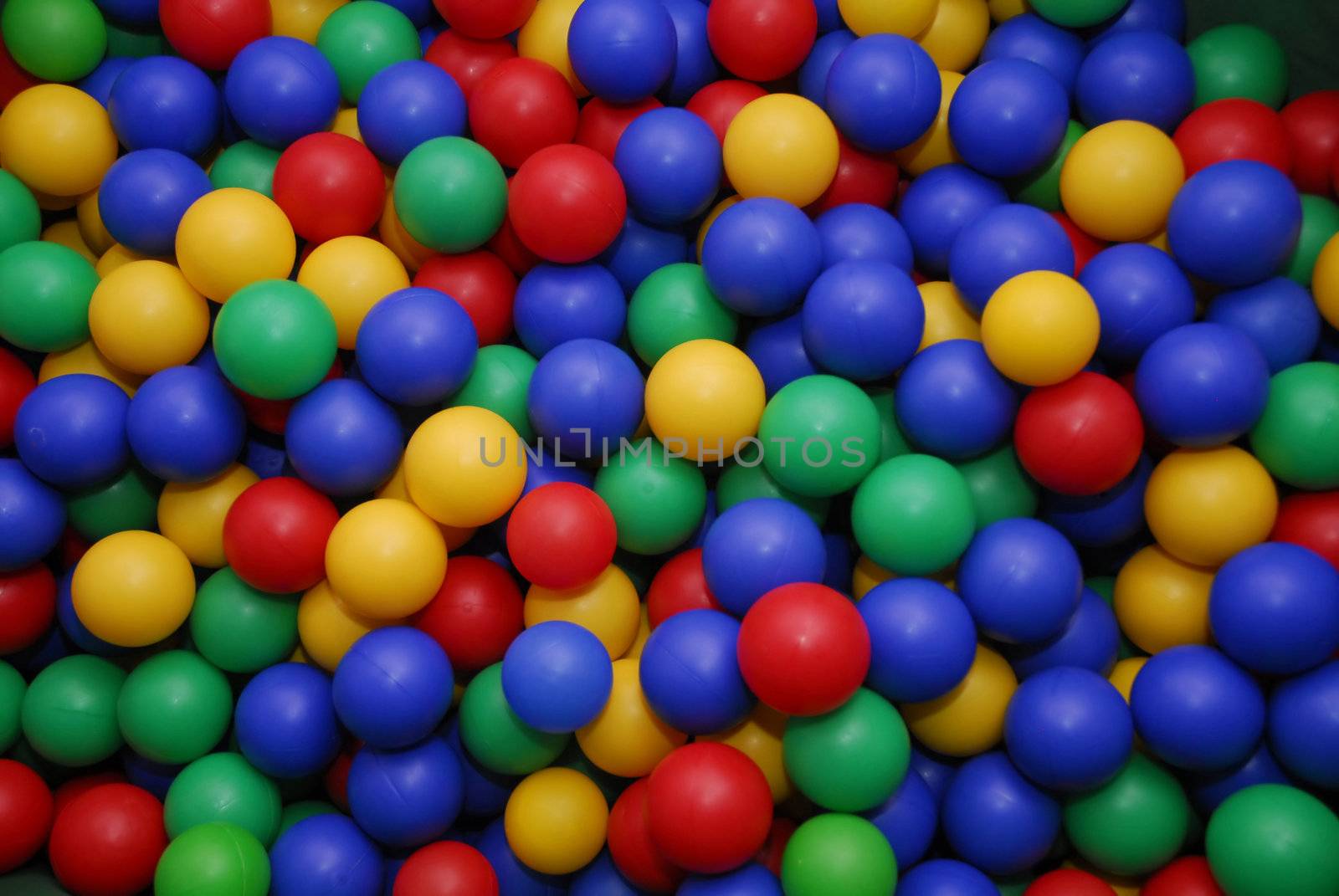 Multi-coloured toy balls.