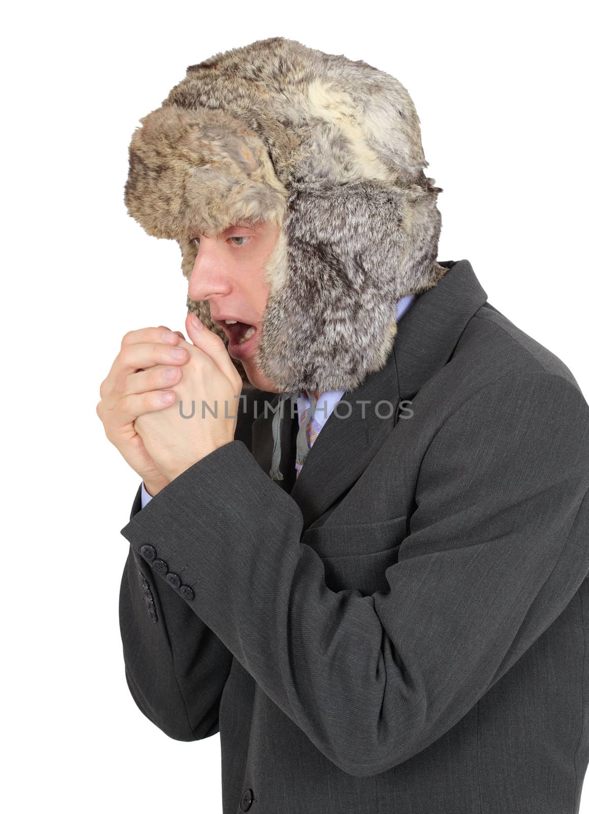 Freezing businessman in fur hat isolated on white background