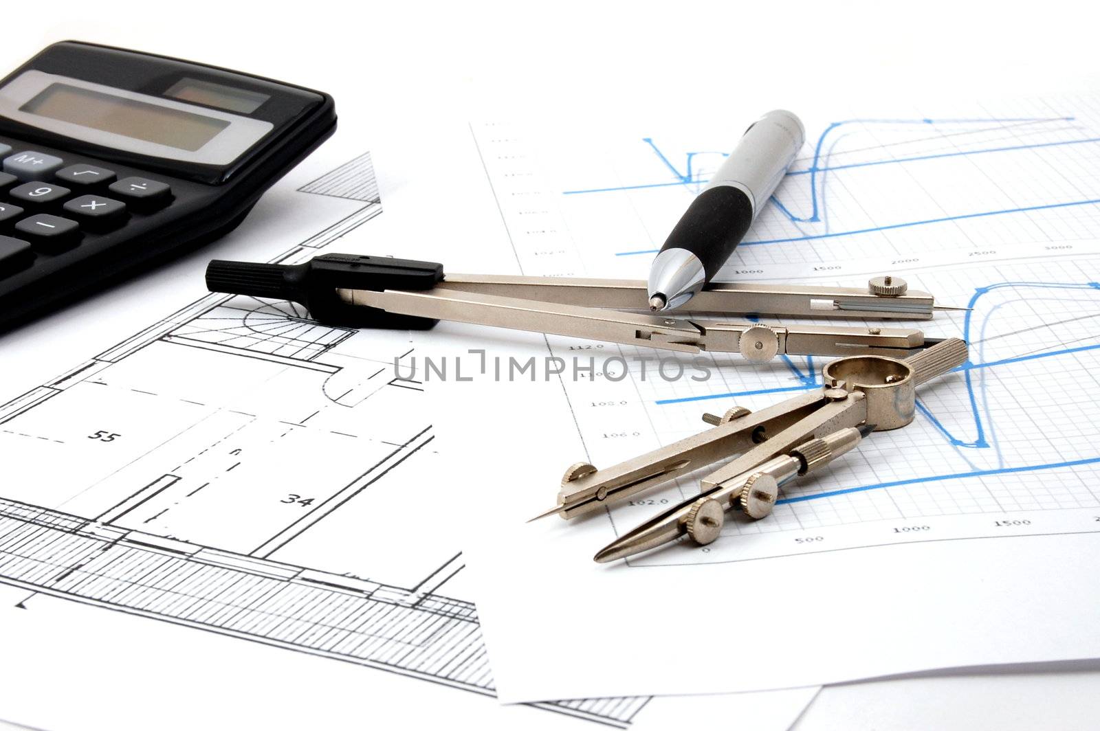 architecture or business still life with plans as background