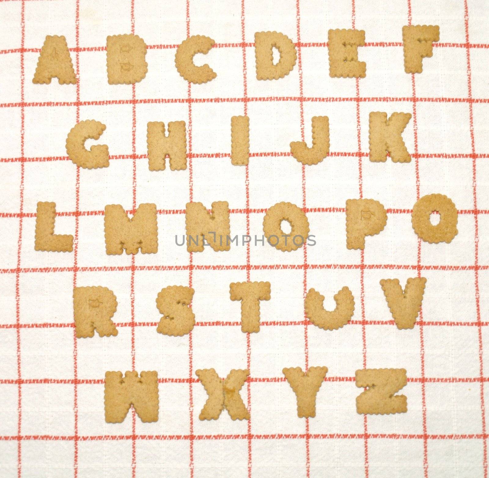 Alphabet written with bisquits