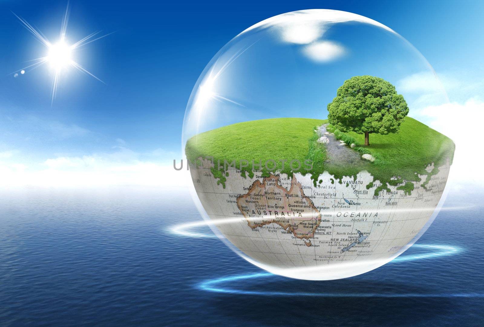 A globe with tree and river on the blue shining sky background
