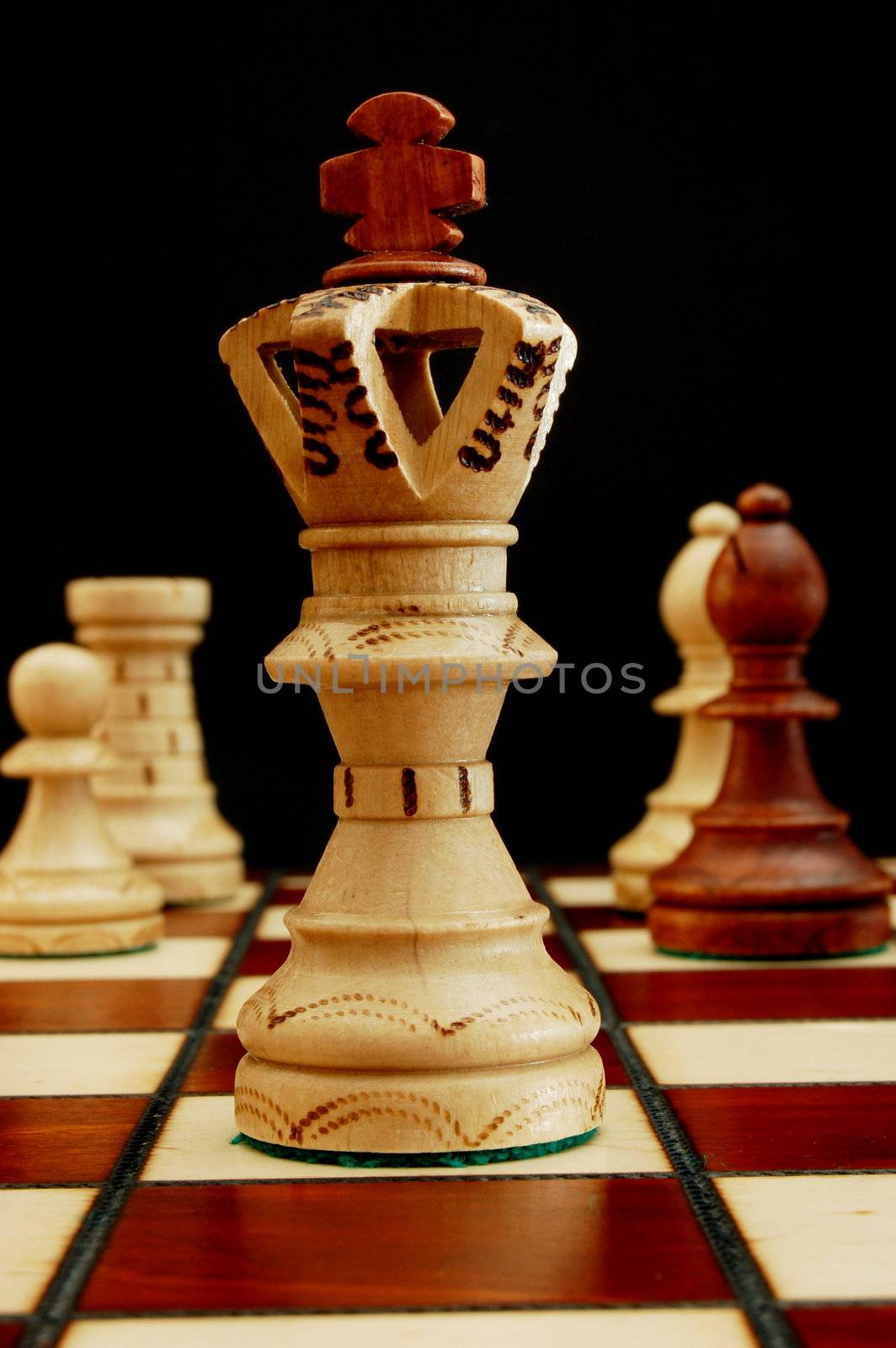 chess pieces showing power competition conflict and strategy in business