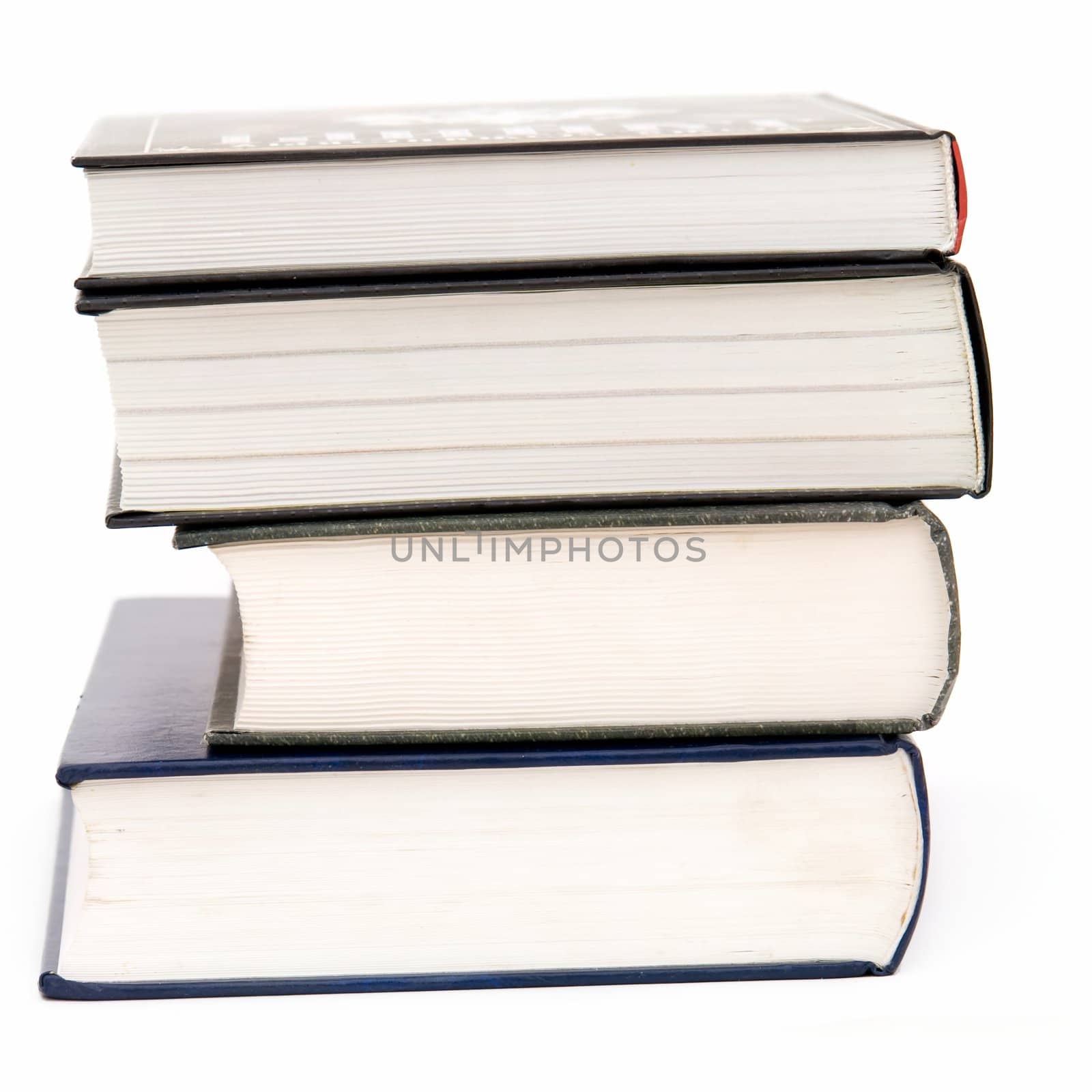 Some thick books on a white background