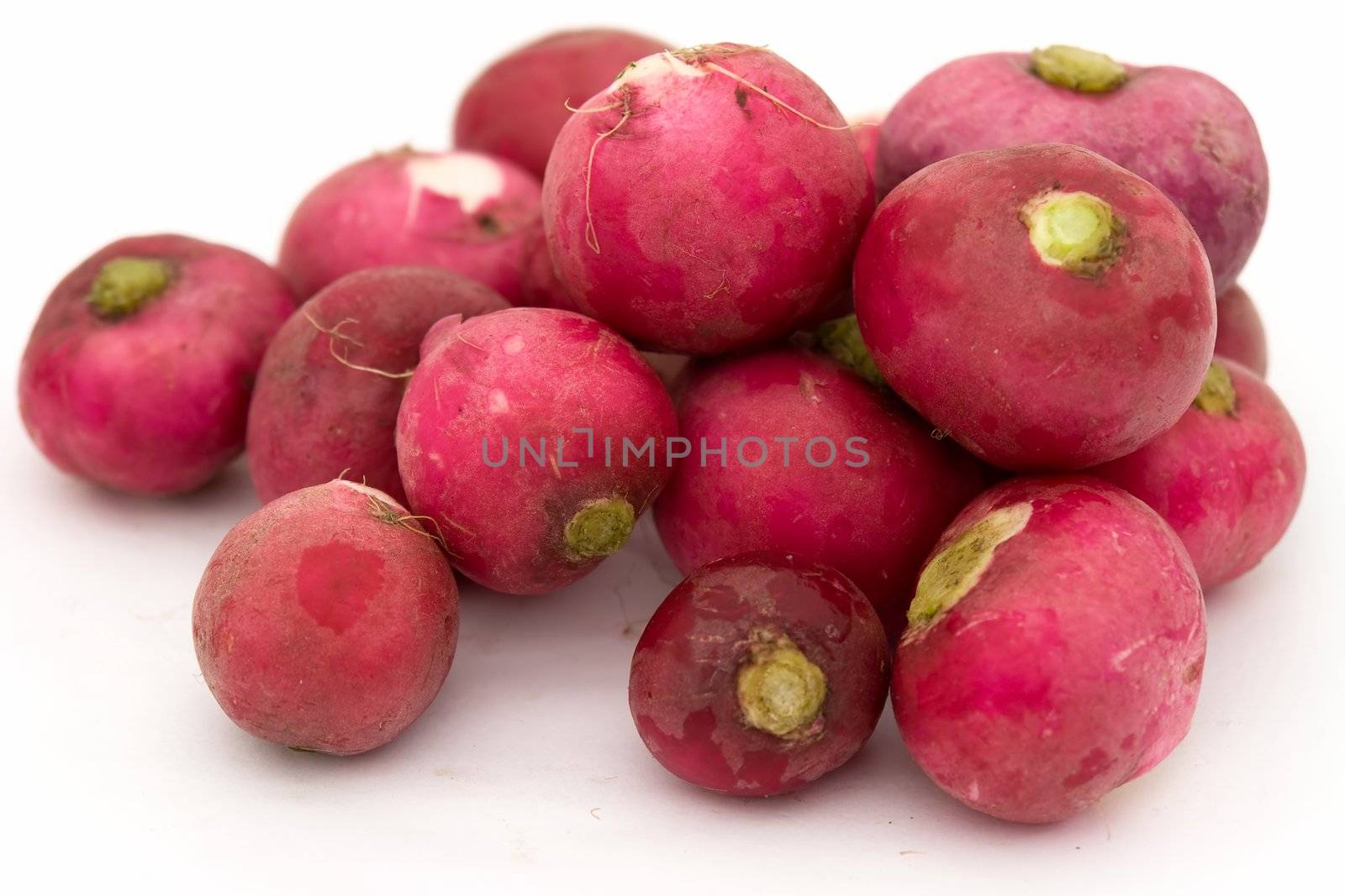 Some garden radishes on a white background