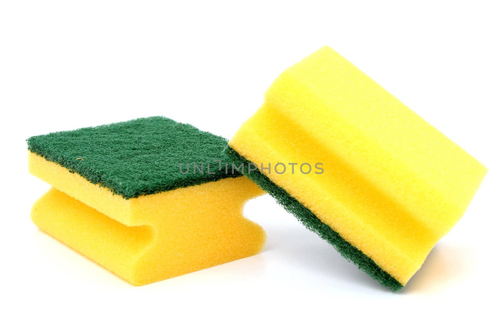 Sponge for washing utensils, on a white background 