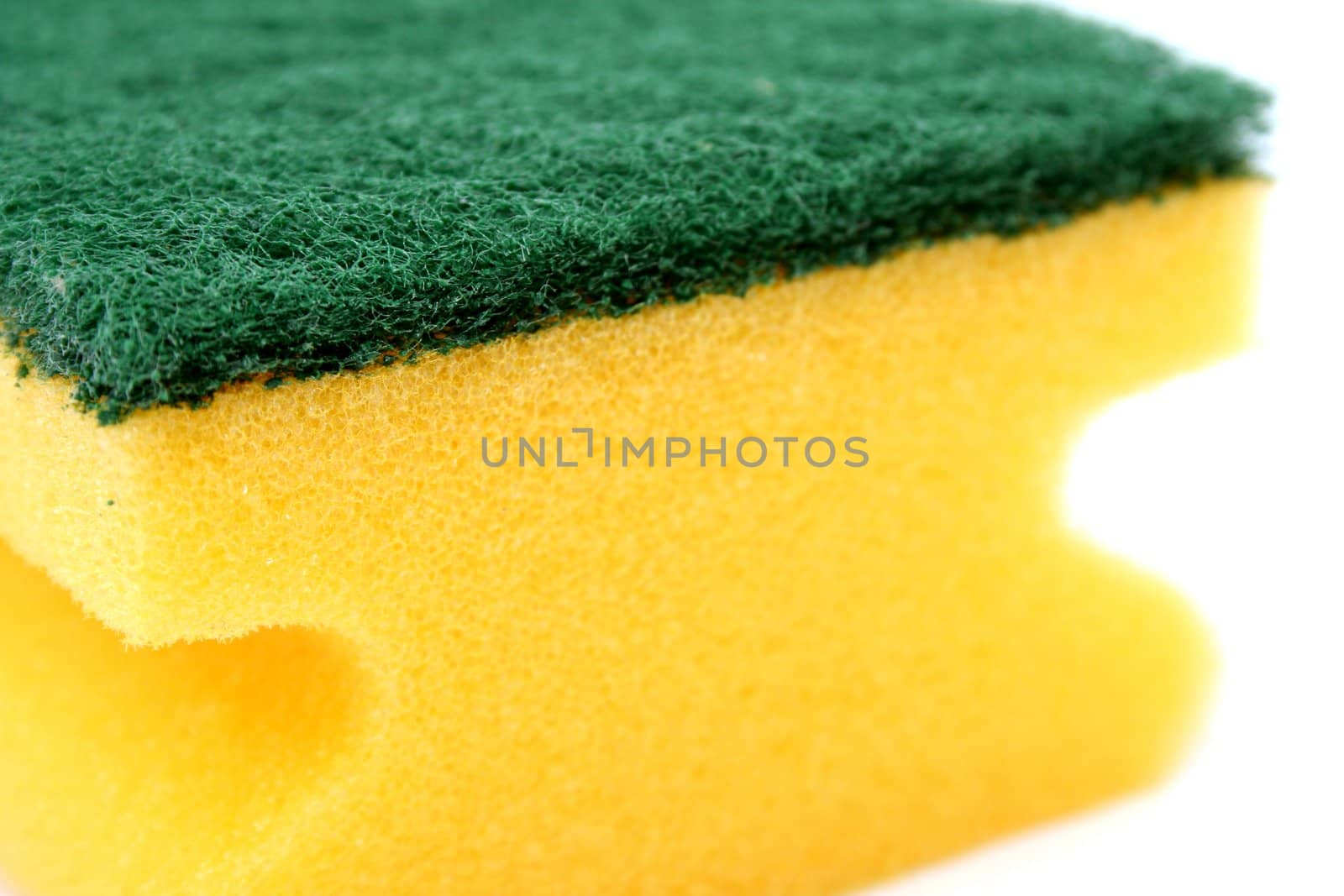 Sponge for washing utensils, on a white background 