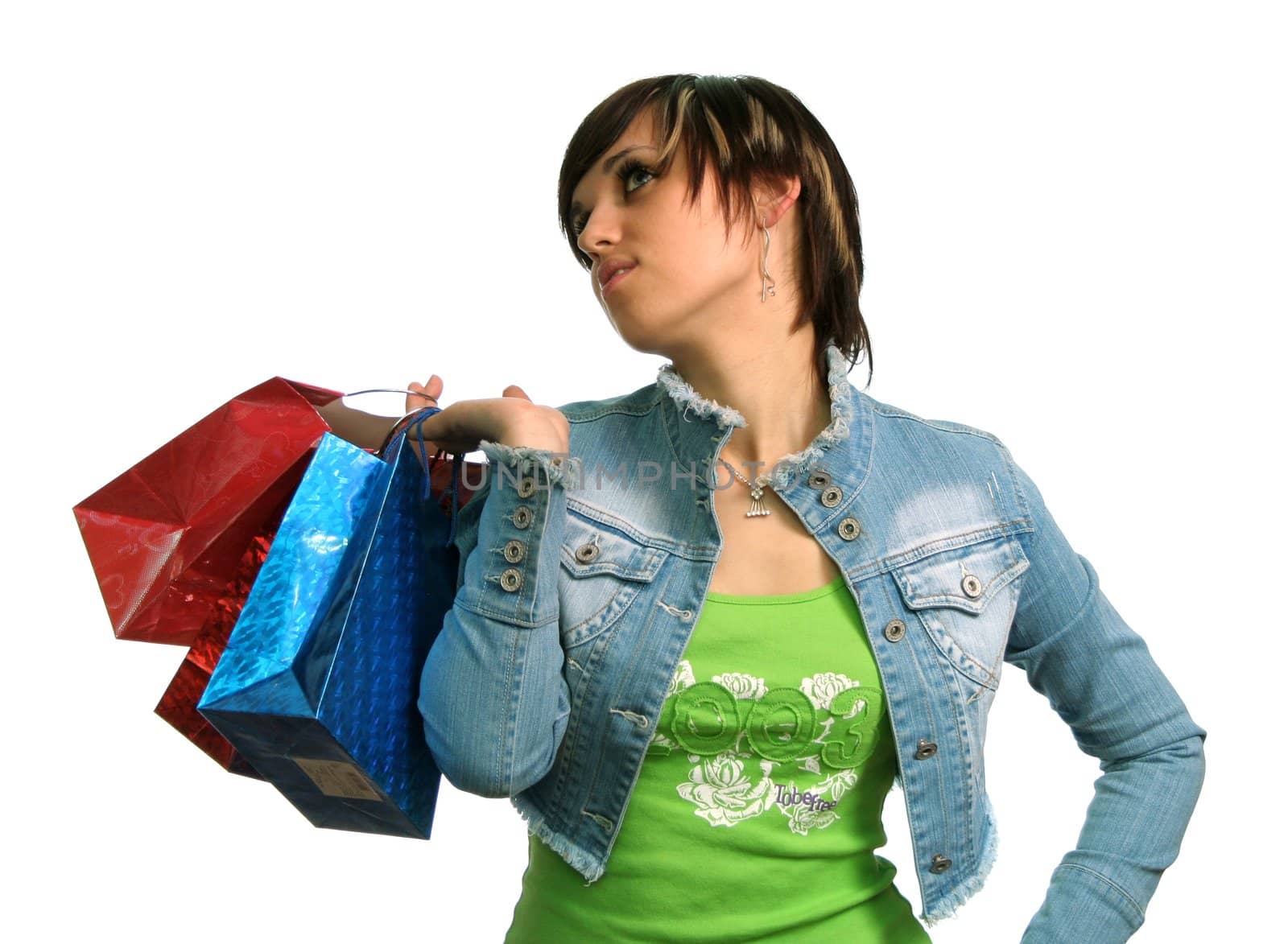 The happy girl with purchases, on a white background 