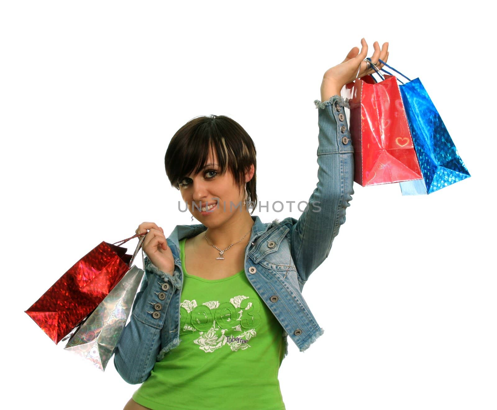 The happy girl with purchases, on a white background 