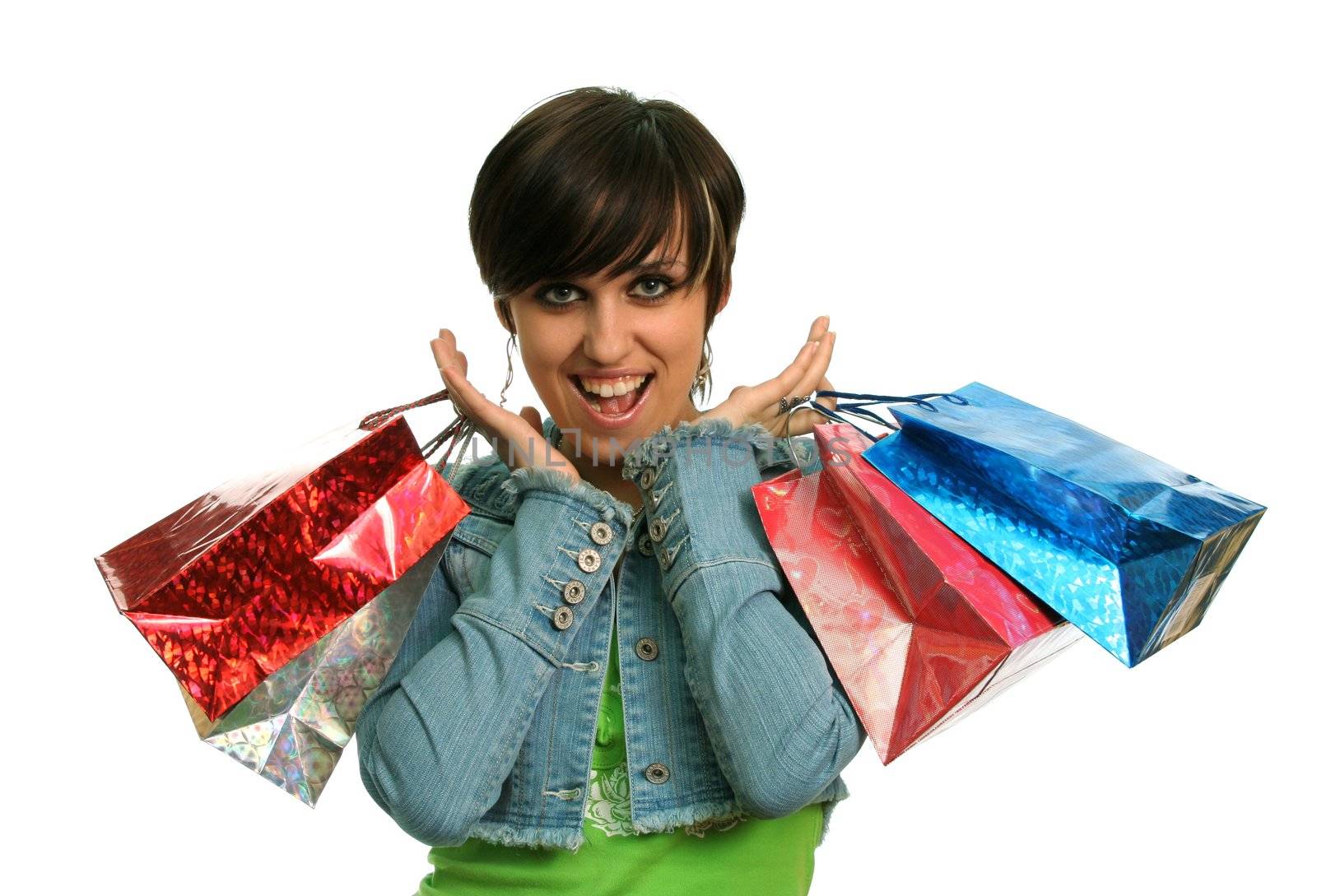 The happy girl with purchases, on a white background 