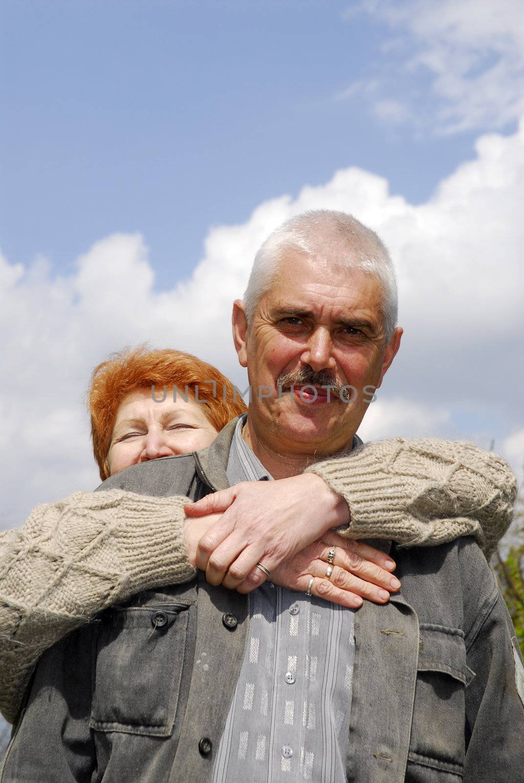 Couple of woman and man 60 y.o. 2