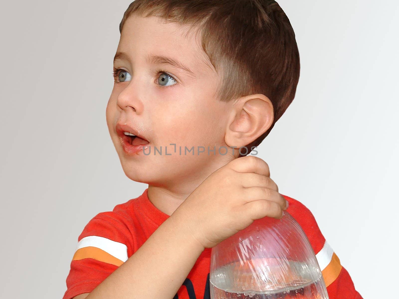  The boy with a bottle on a white background by myyayko