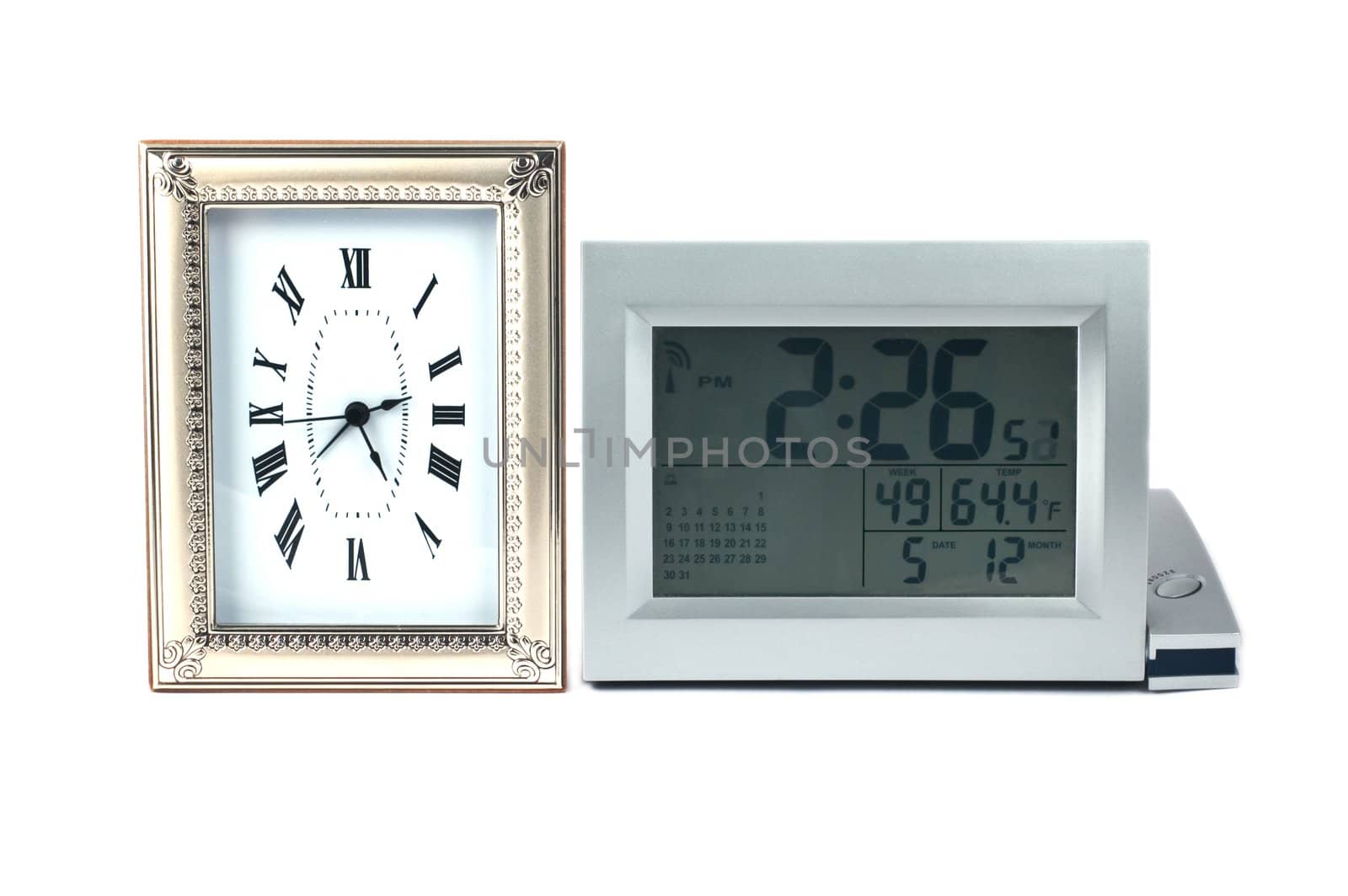 Two different clocks side by side isolated on white