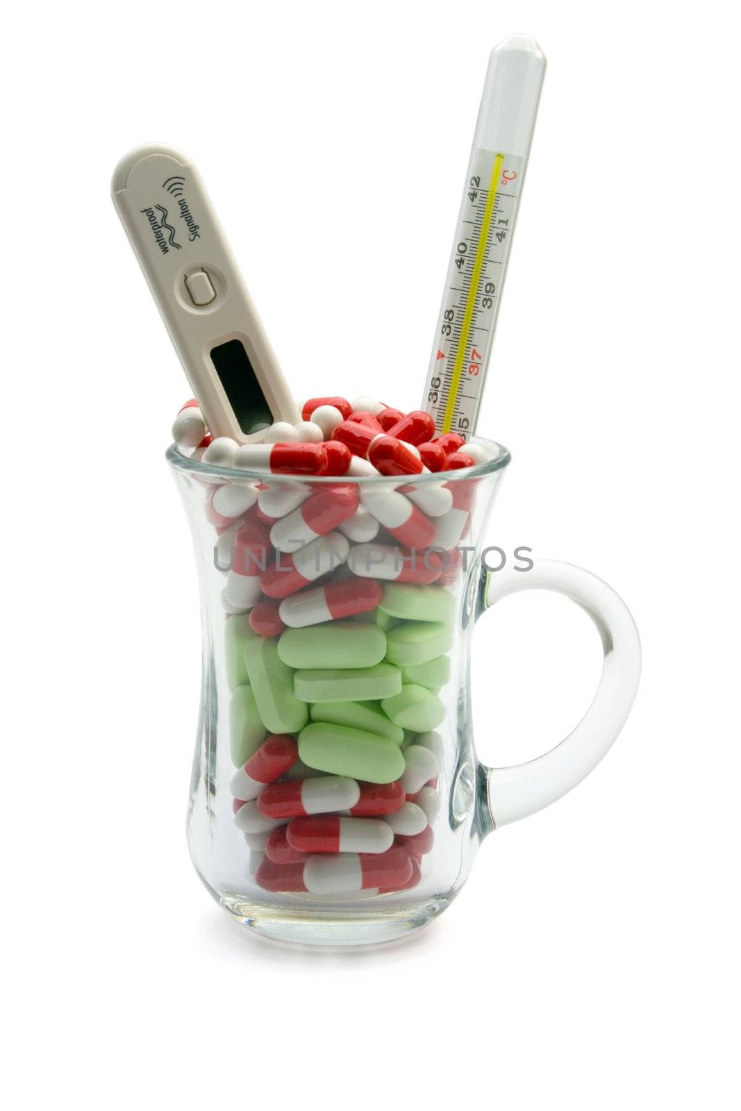 Glass full vitamin and two thermometers,Isolated on a white background