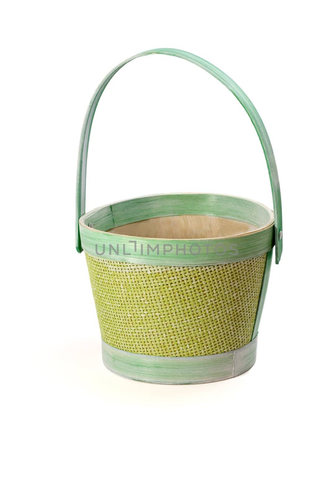 Empty green wicker basket on white background