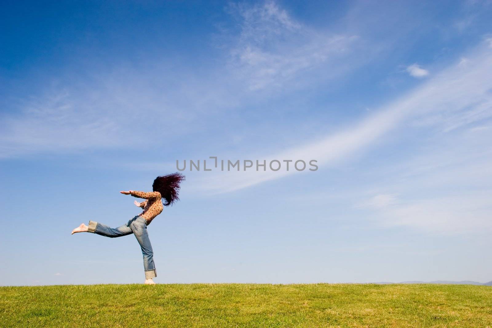 Woman on green field