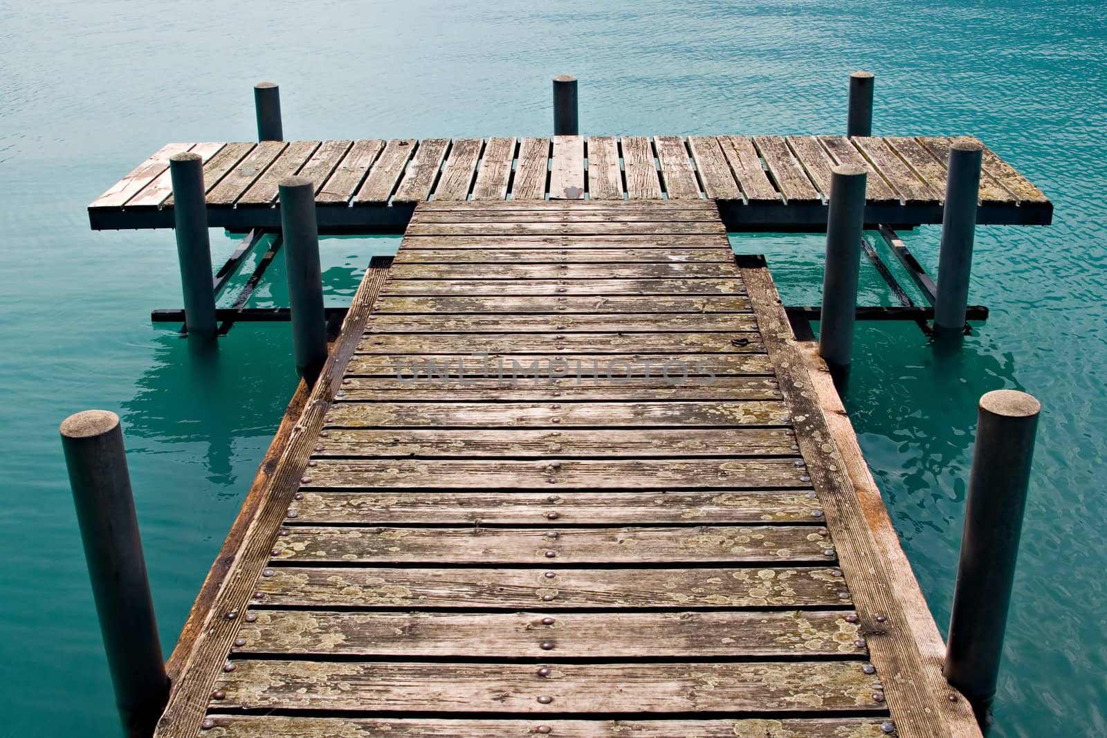 Empty dock in calm lake