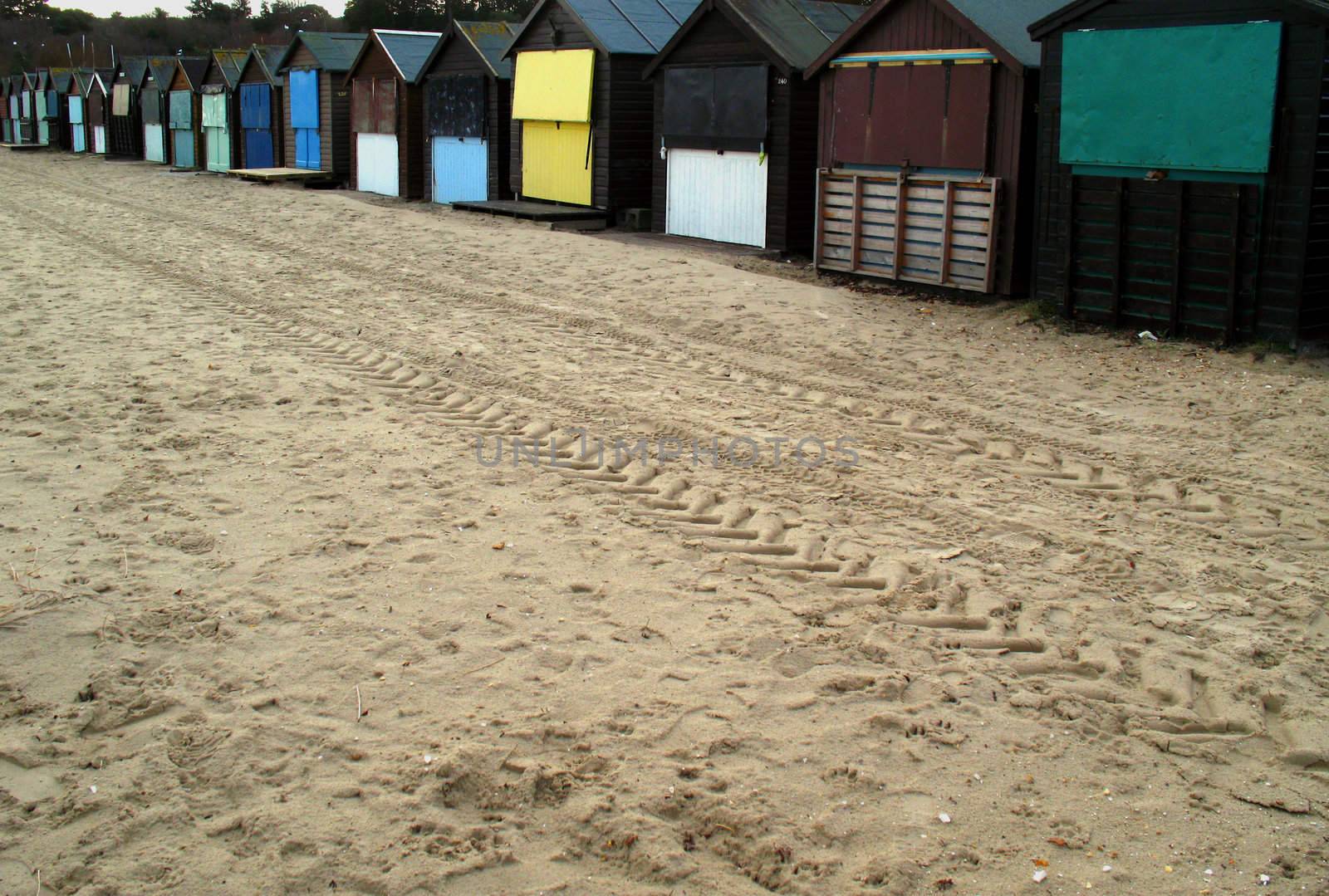 Beach and huts by tommroch