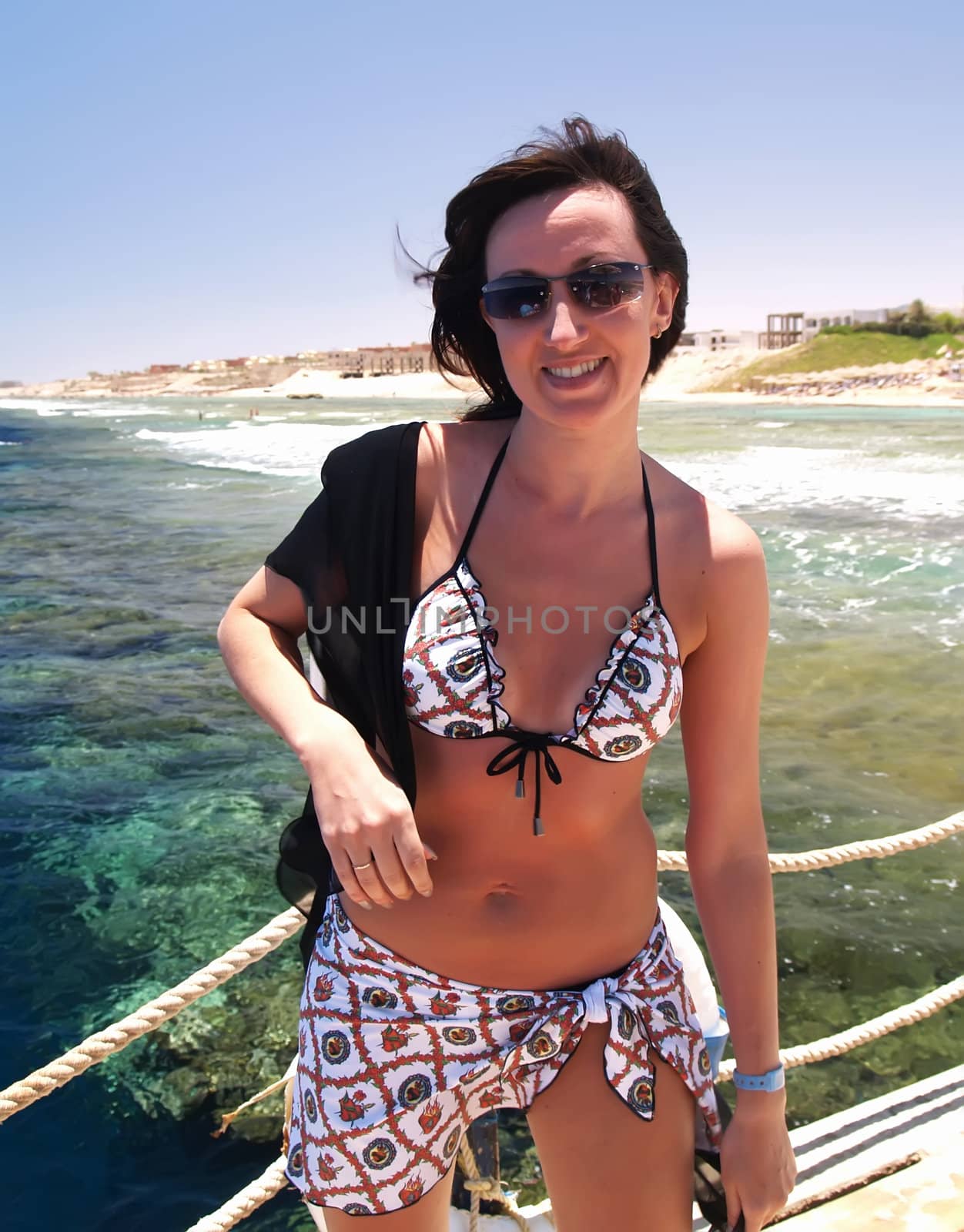 woman enjoying the sun on vacation