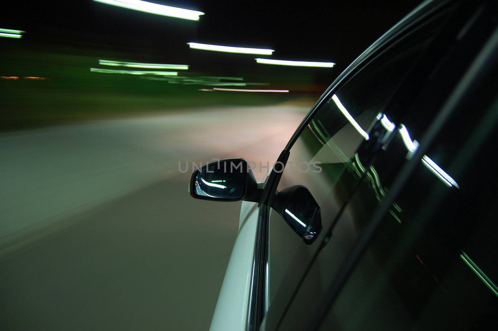 night drive with car in motion through the city shows the speed