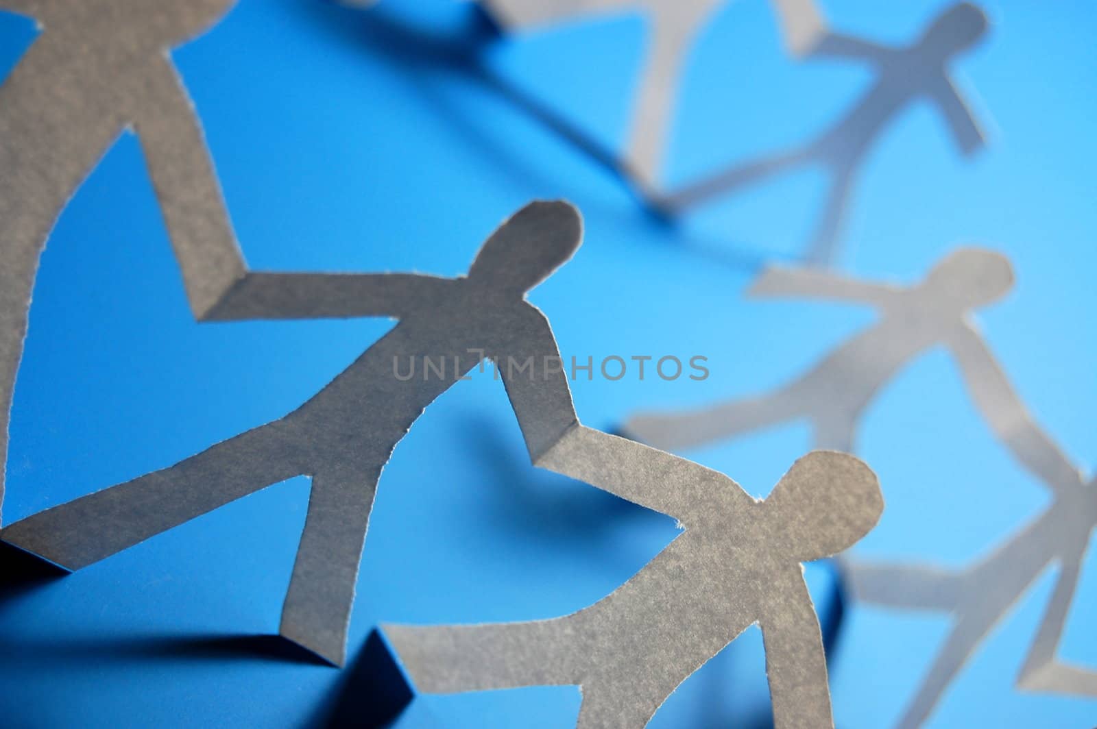 team of paper people having a party