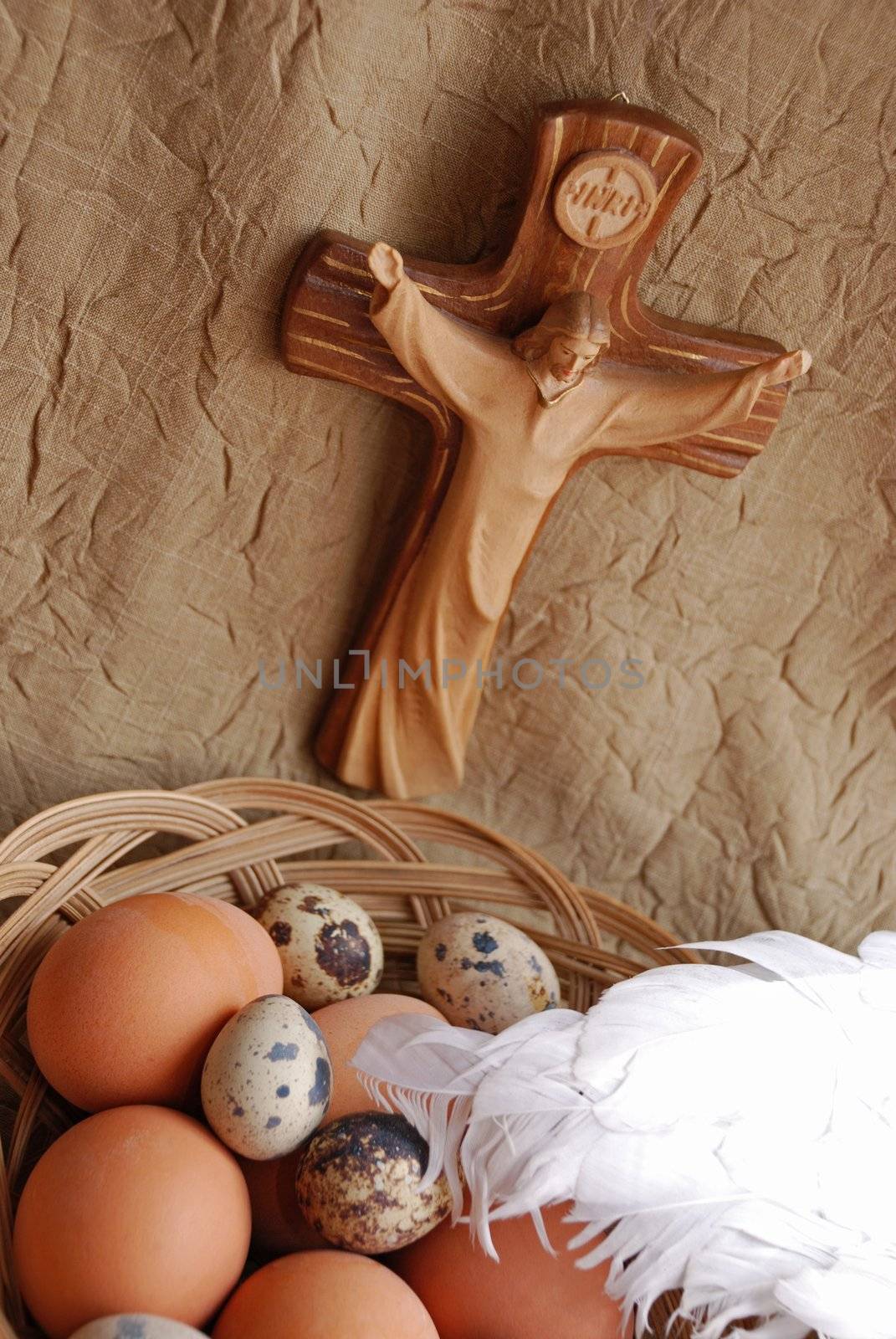 Easter eggs,wings and crucifixion close up