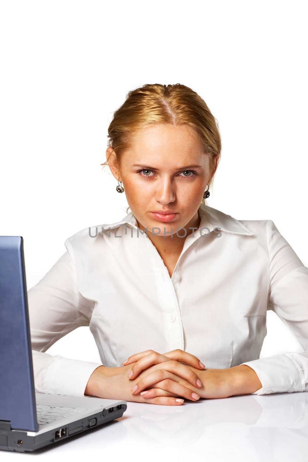 Portrait of a patient young business woman against white background